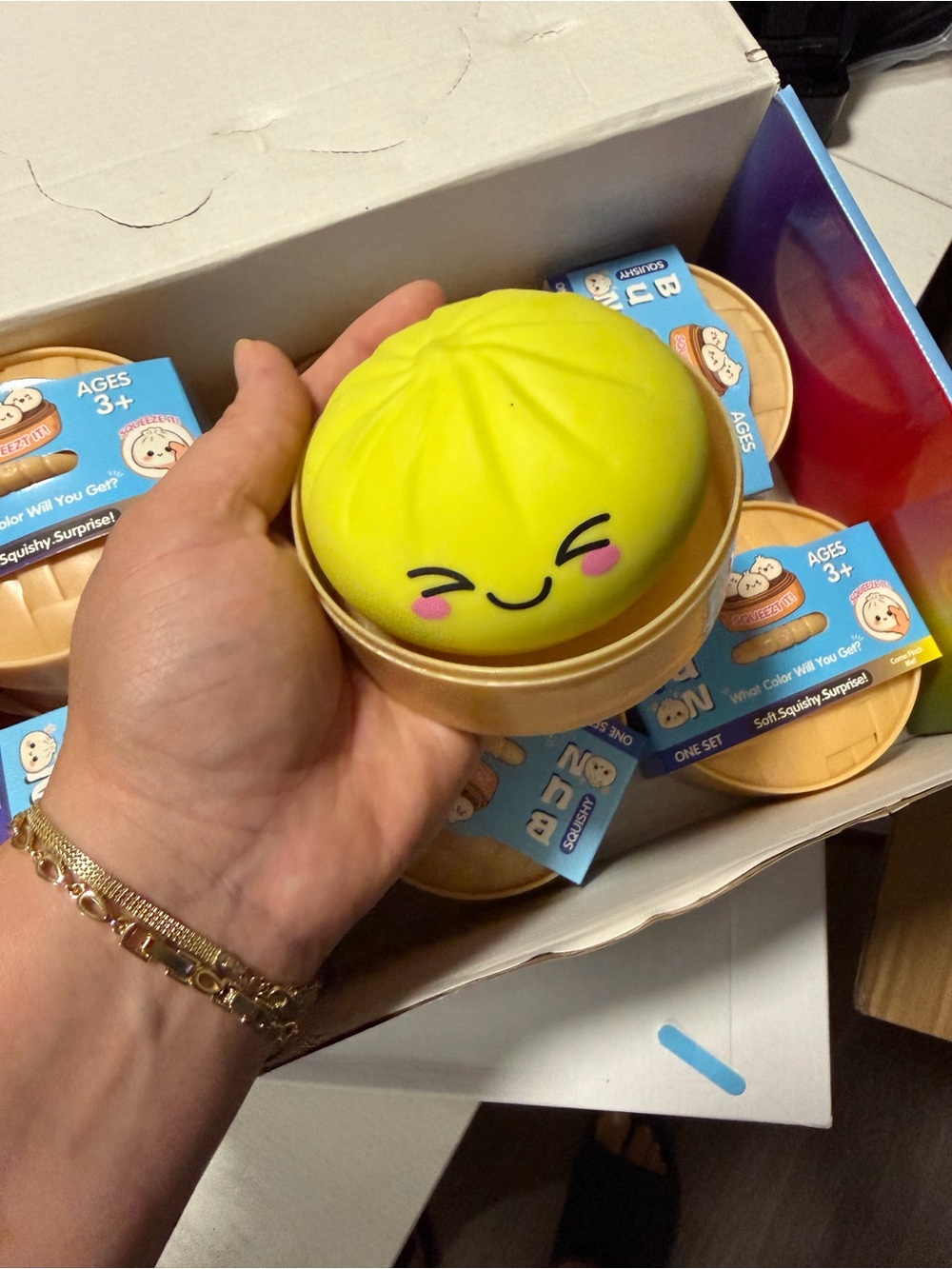 Silly Smiley Squishy Bun Toy - Bright Yellow